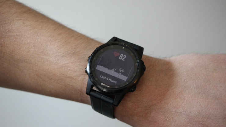 The image shows the heart rate monitor reading on a standard smart watch.